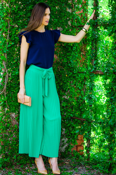 green pleated pants